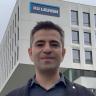 Gokhan Serhat in front of KU Leuven - Bruges Campus